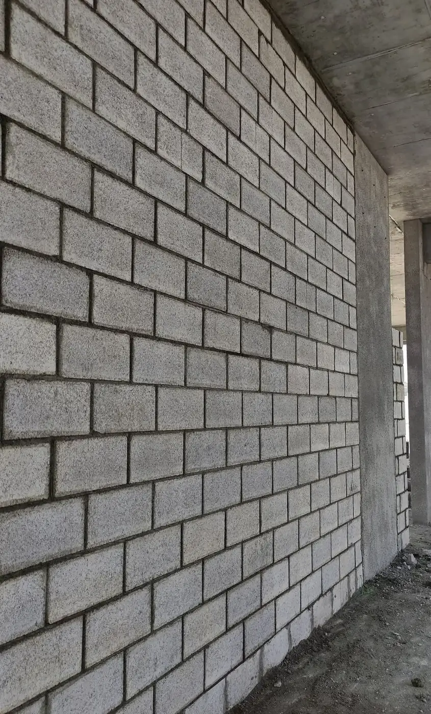 Solid concrete block wall