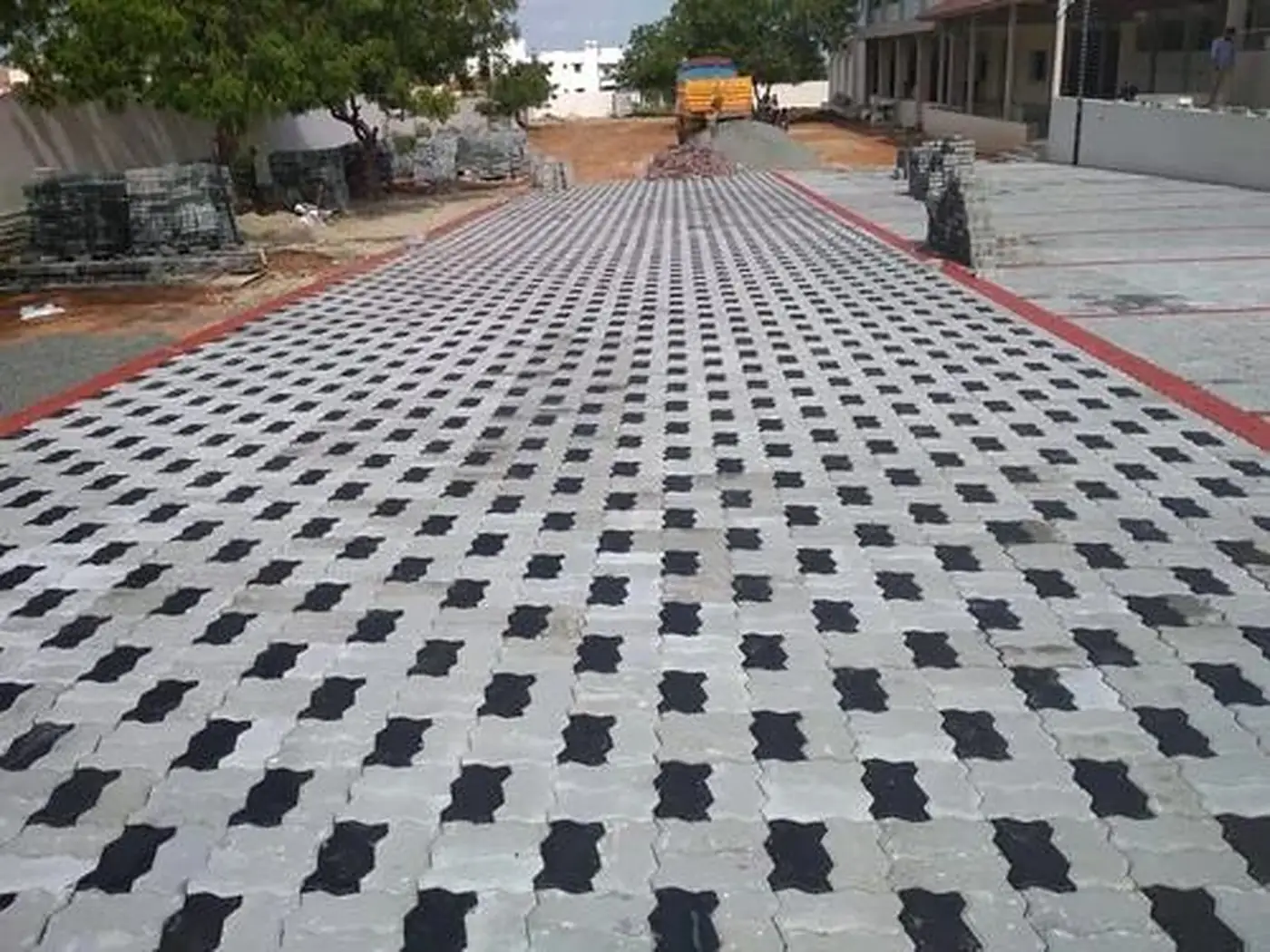 Large zigzag paver yard being laid